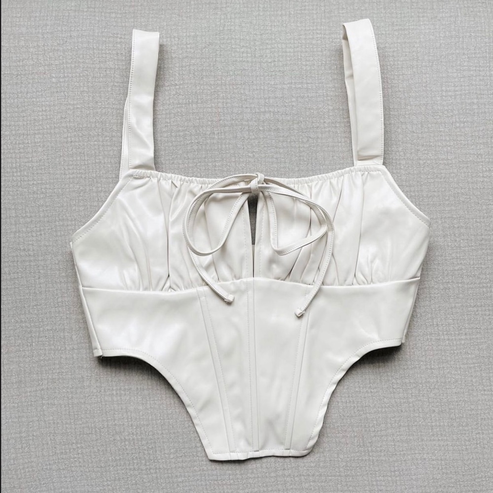 Shut It Down Corset by WANDERLUSH